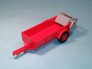 1:43 - rozmetadlo RUR-5 k traktoru Zetor Crystal 12045 - stavebnice - červená 